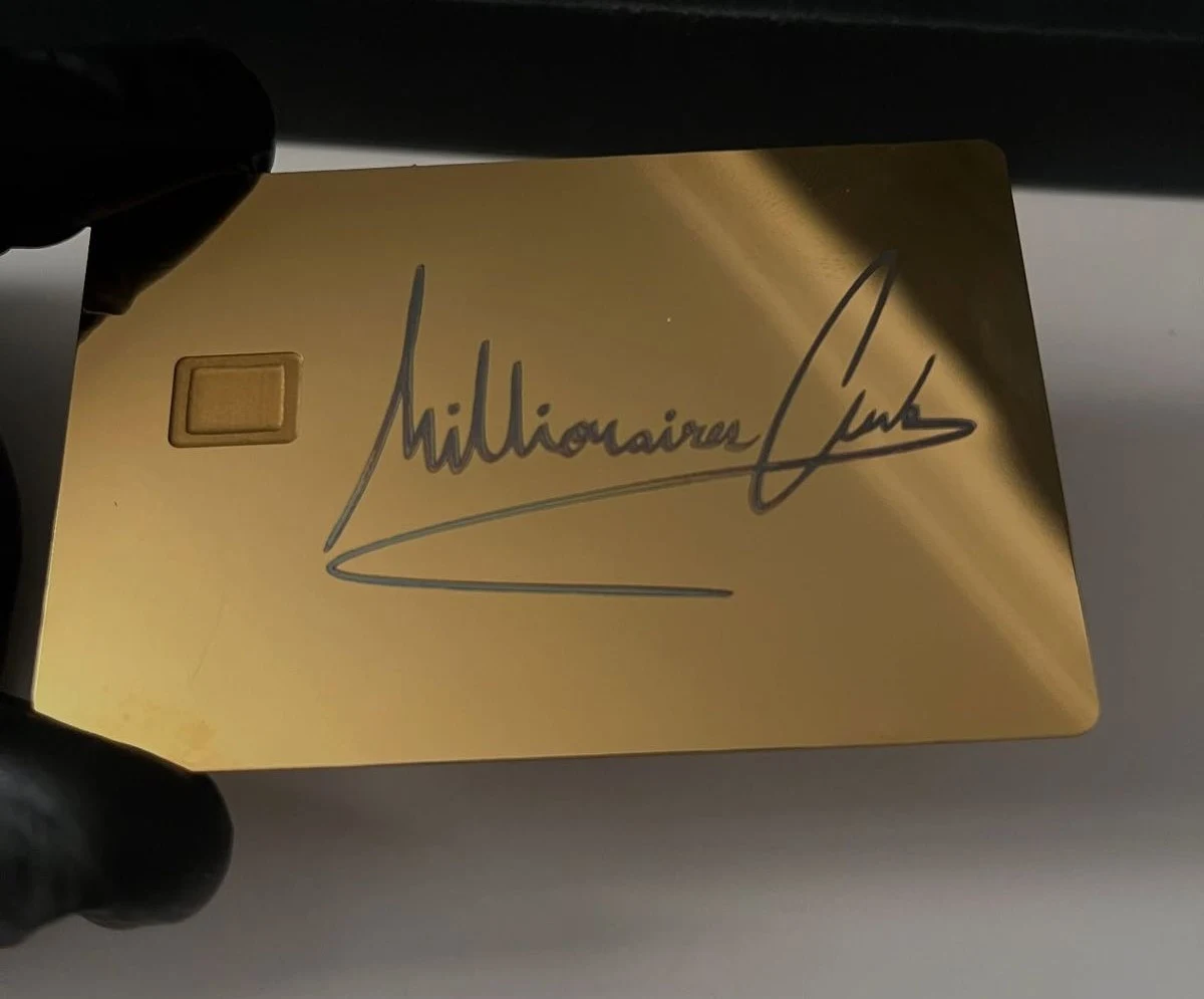 Happy customer review showcasing a custom black metal credit card